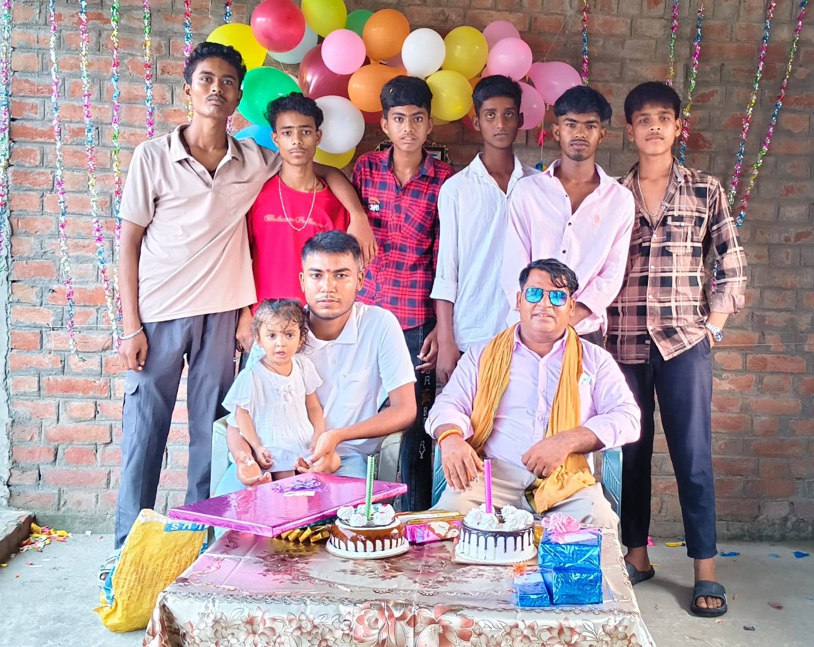 Boys from the centre with their teachers at a celebration